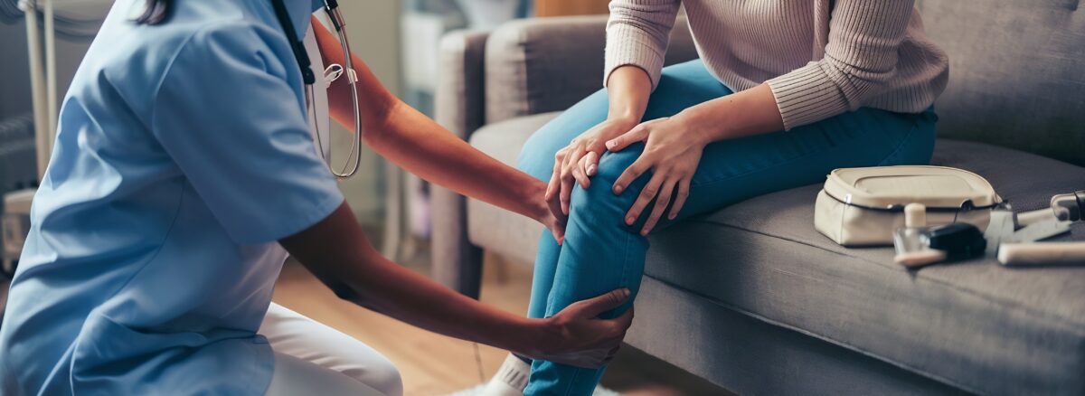 Doctor providing diabetic foot ulcer treatment to patient in Fayetteville GA