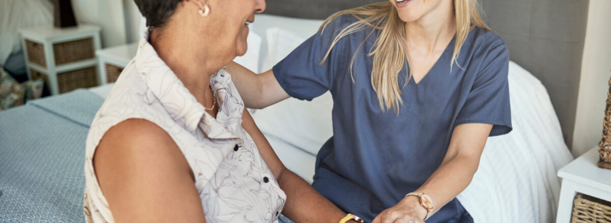 Nurse providing wound care treatment to senior patient covered by Medicare Part B