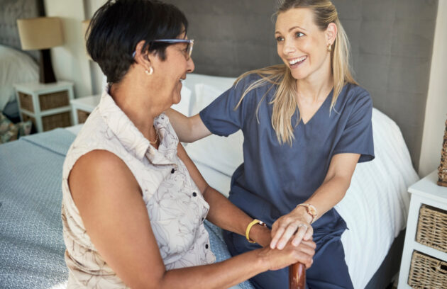 Nurse providing wound care treatment to senior patient covered by Medicare Part B
